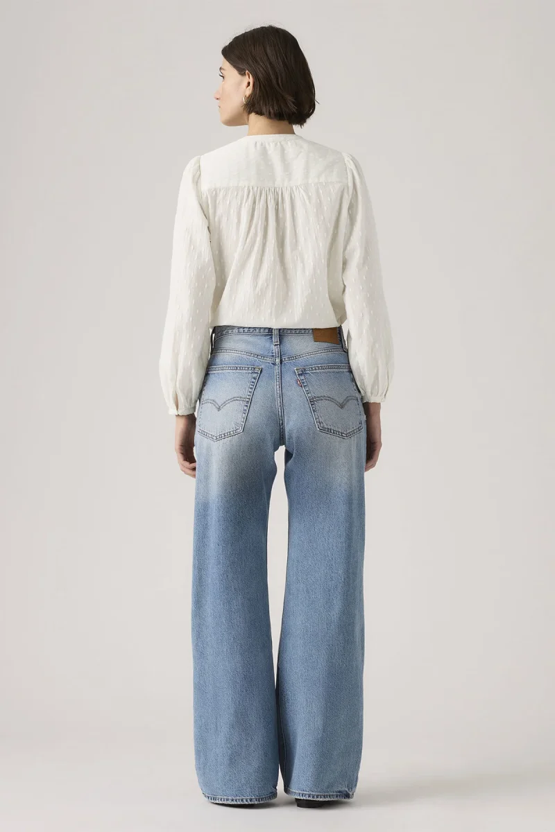 Jeans bootcut dal taglio ampio - immagine 7