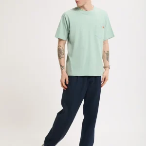 Pantaloni Bio Wash con pinces e gamba affusolata