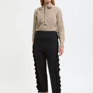 Pantaloni con bande laterali a balze.